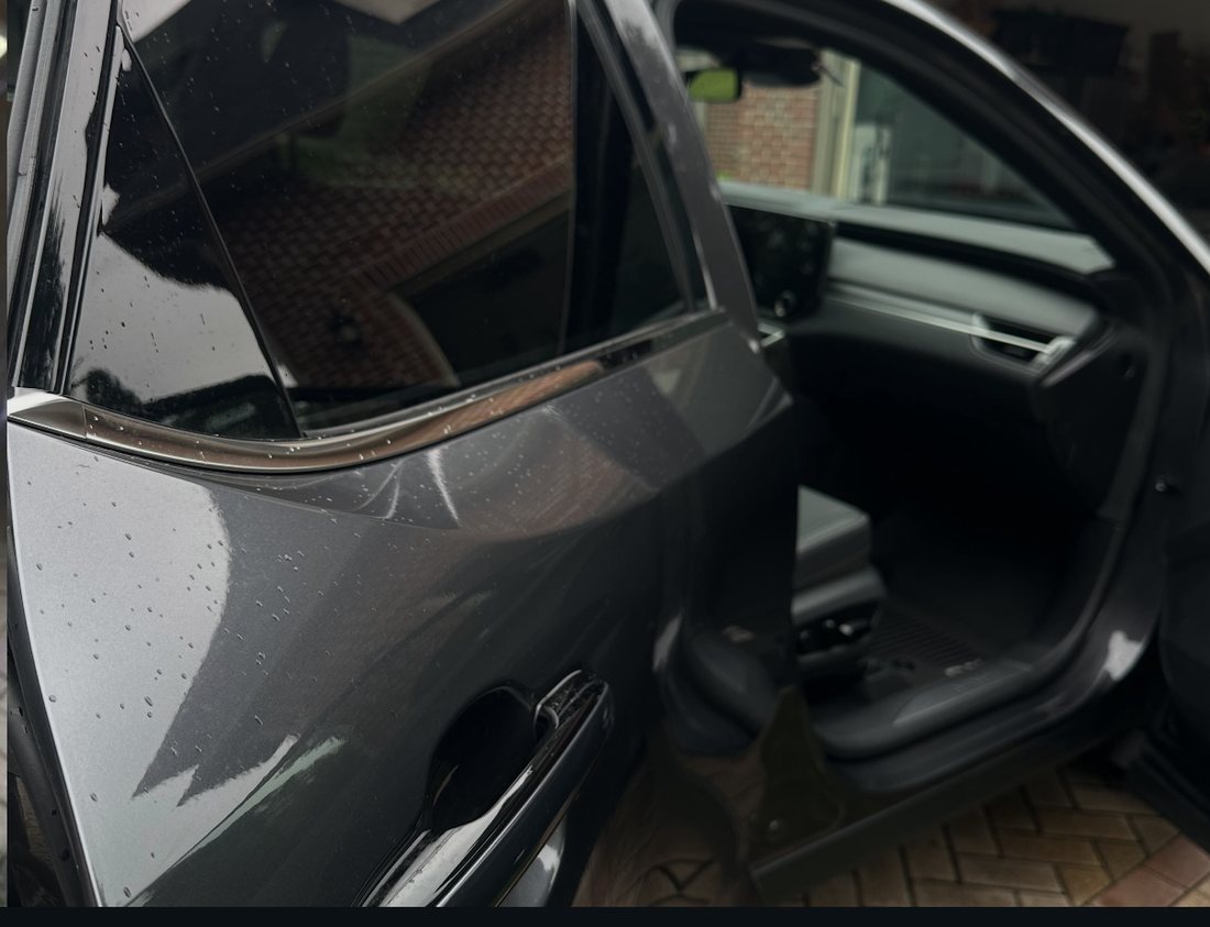 Hydrophobic beading on a freshly sealed door panel